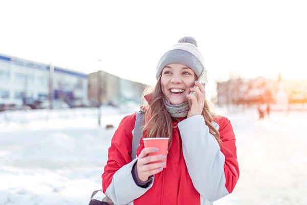 woman in red jacket