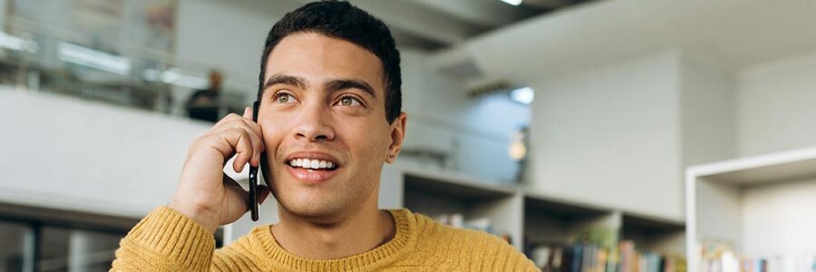 Happy man talking on the phone